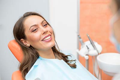 woman smiling after getting a smile makeover in Dallas, GA